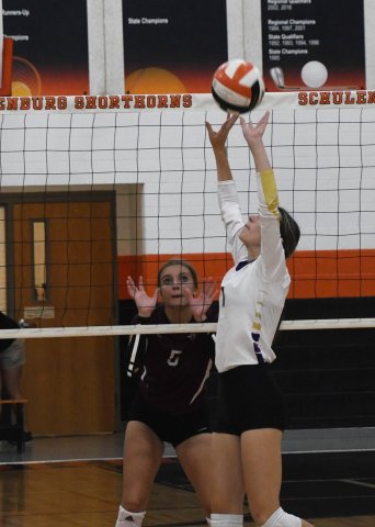 Meghan Blaschke makes a set in the East Bernard match on Friday. Photo by Mark Lube,
