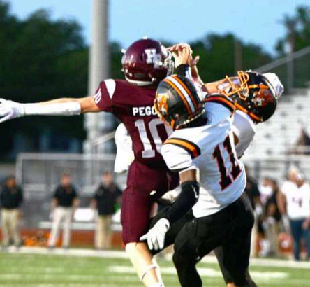 This pass was out of reach of Mycole Pegoda (10), but nonetheless led the Brahmas in receiving with 3 for 29 yards. Chuck Grafe/