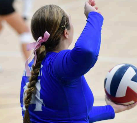 Kalynn Fikac serves vs. Summit. Chuck Grafe/Tribune-Herald