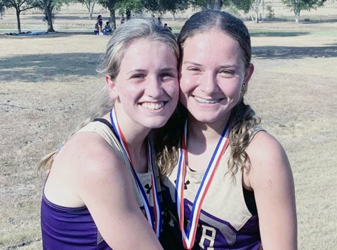 Hayleigh Burns (left) took fourth place individually and Emma Joslin (right) was No. 14 at the Schulenburg meet on Thursday. Photo courtesy of Michelle Winkenwerder.