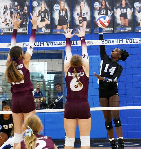 Jayana Phillips had 10 kills in Friday's match against Hallettsville. Photo by Mark Lube.