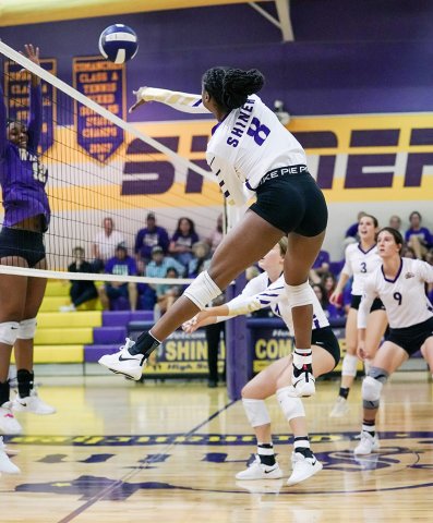 JaMya Wright with a kill attempt against Weimar. Photo by Photos by Lori Raabe.