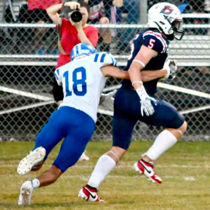 Clayton Janak (12) makes a tackle. Melissa Kutac/Tribune-Herald