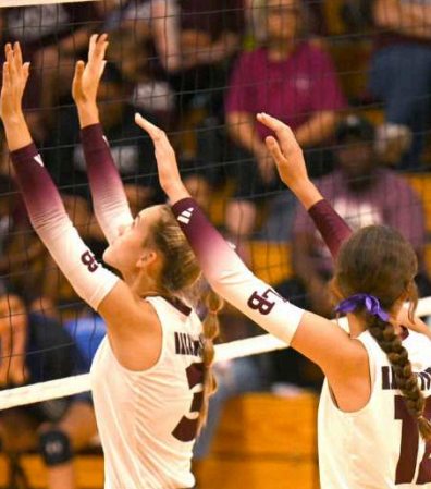 Sophomore Adison Bujnoch (3) and freshman Jans Henke get ready at the net. Chuck Grafe/Tribune-Herald