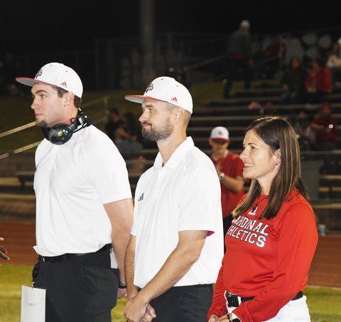 St. Paul honored all of their coaching staff on Coaches’ Day. Pictured, from left are Ryan Geiger (assistant football, head boys basketball, assistant track), Charlie Mieschen (assistant football, assistant boys basketball, head baseball) and Nicco Brown (head volleyball, head cross country, assistant girls basketball, head golf and assistant girls track). Photo by Mark Lube.