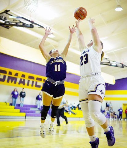 Shiner’s Kailey Boedeker scores on a lay up to open a large lead on LaGrange late in the game at the Shiner High School gym  Nov. 14. Boedeker scored eight points. Photo courtesy of Howard Esse.