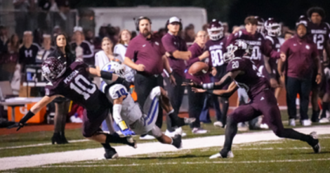 Linebacker Jashaun Price (20) intercepts a pass with 1:34 remaining in the fourth quarter to seal the victory over Yoakum. Photo by Howard Esse