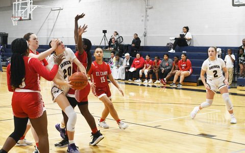 Morgan Lenehan (second from left) is defended by three El Campo players while Caliie Sevcik (far right) positions herself for a rebound or pass. Photo by Mark Lube.