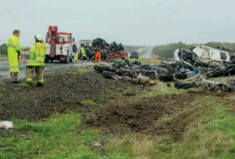 An 18-wheeler hauling a load of crushed vehicles rolled over on Interstate 10 west of Flatonia last Thursday morning. Photo by Andy Behlen/The Fayette County Record
