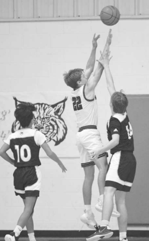 Riley Haas puts up a shot in the win over Bastrop Tribe. Chuck Grafe/Tribune-Herald