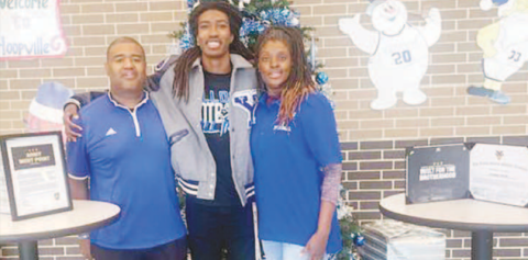 Yoakum High School senior Zachary Taylor recently signed with Army to play football. Pictured from left to right are Zachary’s father Roderick Taylor, Zachary Taylor, and Zachary’s mother Chastity Taylor. Photo by Mark Lube.
