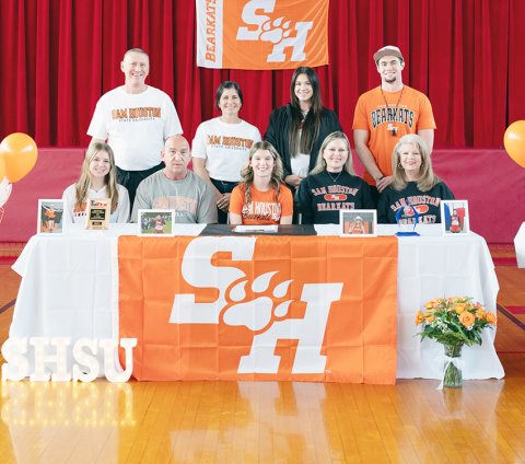 St. Paul senior Brooke Cerny signed a letter of commitment to run cross country and compete in track for the Sam Houston State University Bearkats. Seated from left are Kristin Cerny, Matt Cerny, Brooke Cerny, Bridgette Cerny and Nancy Hajovsky. Standing from left are Jake Wachsmuth, Nicco Brown, Emma Mikulik and Ryan Geiger. Photo courtesy of Photos by Lori Raabe. 