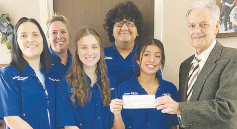 Pictured in the front row from left to right are Kristin Hagan, co-advisor, Leah Muenich, co-Energy and Environment Committee; Abbie Galvan, Student Council President and Project Leader, Garlan Weber, Kluck Foundation Director. Pictured in the back row from left to right are Amy Robbins, co-advisor of Student Council and Rafael Quilpas, Student Body President. Contributed photo.