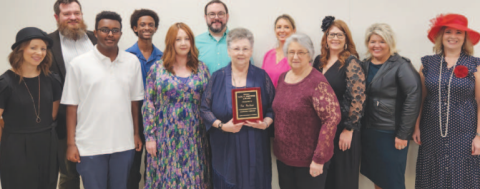 Tim Faulkner was posthumously awarded the 2024 Paul F. Gustwick Award during the 106th Yoakum Chamber of Commerce (YACC) Awards Banquet held on Jan. 25. Pictured in the center is Martha Faulkner, along with Faulkner family members, 2023 Paul F. Gustwick Award recipient William “Bill” Wimberly’s family members, and YACC directors. Staff photo.