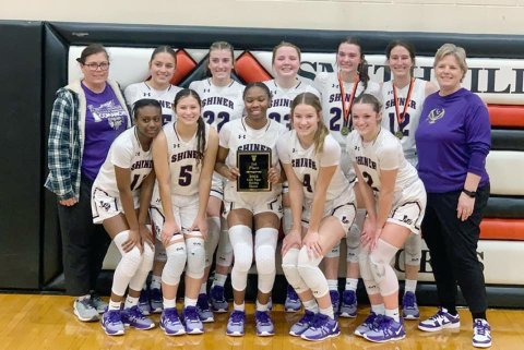 2023 Smithville Tournament Champions Shiner Lady Comanches. Bottom row from left are Jaliyah Barnett, Brooke Palmer, JaMya Wright, Aimee Mitchon and Callie Sevcik. Top row from left are assistant coach Michelle Winkenwerder, Brinley Ramirez, Addy Siegel, Kailey Boedeker, Morgan Lenehan, Rylee Vancura and head coach Kristi Peterson. Not pictured is Amelia Pohler. Photo courtesy of Cari Lynn Siegel.