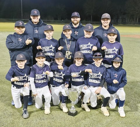 Front row from left are Nicholas Simper, Beckett Heibel, Ayden McCord, Kolt McFarlin, Landon Chovanetz, and Ryder Robinson. Second row from left are Alonzoe Saldana, Jase Peters, Paul Filip, Payten McCord, and Jax Davila. Back row from left are  Coach Blue Hybner, Coach Austin Popp, and Coach Cole Hybner. Not pictured is Luke Spann. Photo courtesy of Kevin Filip.