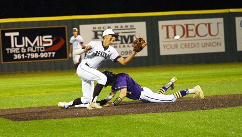 Cale Shows steals second in the first inning as second baseman Tanner Wagner takes the late throw in the Shiner baseball team game at Hallettsville on Monday night. Photo courtesy of Chuck Grafe/Hallettsville Tribune-Herald
