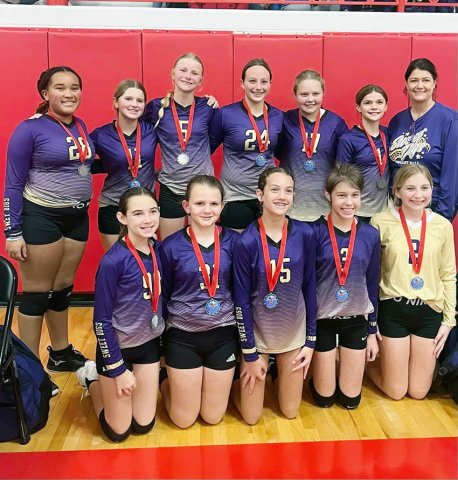 Front row from left are  Haley Malina, Reese Lyons, Addison Ulcak, Ally Trojack and Pyper Neskora. Back row from left are Patricia Price, Lola Hornacky, Kendyl Boehm, Eastyn Pohler,  Charlotte Hairell, Bree Nitsch and Coach Desiree Nitsch. Photo courtesy of Michelle Price.