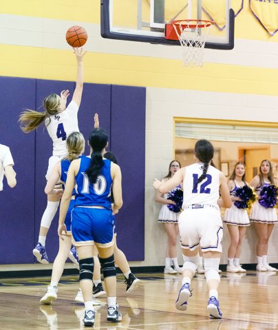 Aimee Mitchon with a jump shot close to the hoop in Shiner’s 65-10 win over Louise on Feb. 6. Shiner went unbeaten in district and defeated Thorndale Monday in the first round. Photo courtesy of Photos by Lori Raabe.