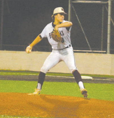 Tanner Cliffe throws the first pitch of the season Monday night. Chuck Grafe/Tribune-Herald