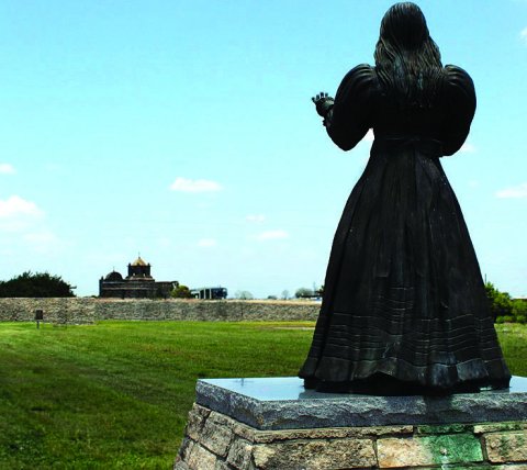 The statue of the Angel of Goliad seems to be watching over Presido la Bahia. This is where Texas soldiers were held before Gen. Santa Anna ordered them to be massacred on Palm Sunday, 1836. – Photo by Murray Montgomery