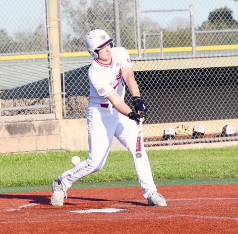 Carter Novak misses this pitch Friday in the game against Pettus. Novak still got one hit, scored one run, brought in one run and stole one base. Photo by Mark Lube.
