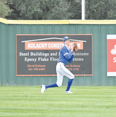 Hudson Kutac snags a fly ball in center. Chuck Grafe/Tribune-Herald