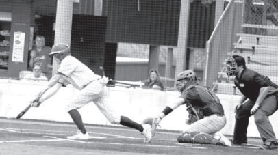Brock Bludau lays down a perfect bunt in the sixth inning in the 4-2 victory over Edna Friday. Chuck Grafe/Tribune-Herald