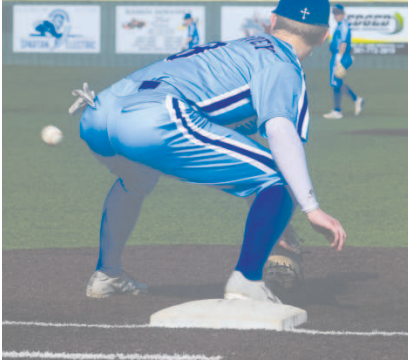 Indian first baseman Emerson Harvey digs out a low throw vs. Shiner. Chuck Grafe/Tribune-Herald