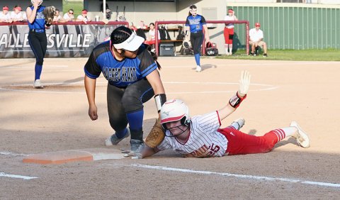 Lady Cardinal Sam Moeller calls for time after a pickoff attempt Thursday at Sacred Heart. The Indianettes completed the sweep but St. Paul kept the score a lot closer as they came up just short 14-13. Photo by Chuck Grafe/Hallettsville Tribune-Herald.