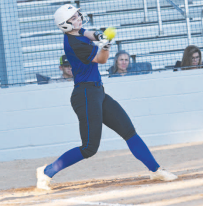 Ava Lackey gets loft on the ball in hitting a home run against the San Antonio Saints. Chuck Grafe/Tribune-Herald