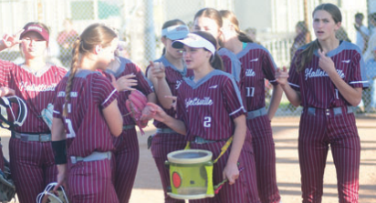 The Lady Brahmas celebrate a win. Chuck Grafe/Tribune-Herald