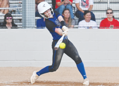 Kenzie Chance hits a RBI single during the six-run third inning. Chuck Grafe/ Tribune-Herald