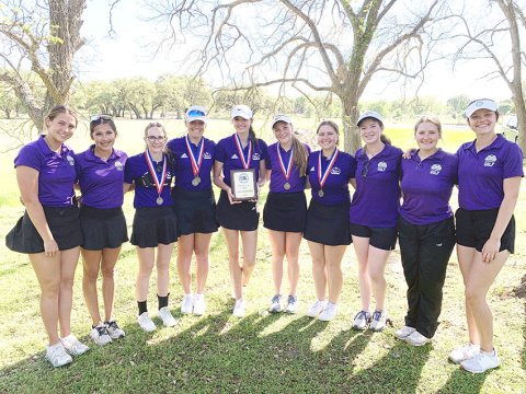 The Shiner Lady Comanches golf team are district champions and team regional qualifers. From left are Chesney Machacek, Jaeleigh Ramirez, Grace Migl, Chelsea Whiddon, Morgan Lenehan, Callie Chrismon, Brianna Sofka, Maddie Collins, Olivia Akin and Evy Johnson. Photo courtesy of Michelle Winkenwerder.