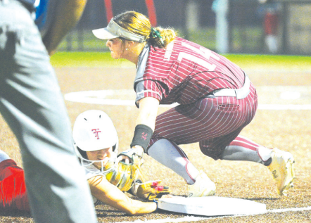 Third baseman Carson Jansky makes a put out at third in the Game 1 win. Chuck Grafe/Tribune-Herald
