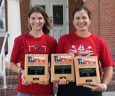 Brooke Cerny (left) and Nicco Brown (right) display the awards that the Shiner St. Paul girls athletic program won. Cerny won the 2024 2A Female Athlete of the Year, the Lady Cardinals program won the 2024 2A Girls Athletics Overall Champions and Brown won the 2024 Edd Burleson Athletic Leadership Award/2A Female Coach of the Year. Photo by Mark Lube.