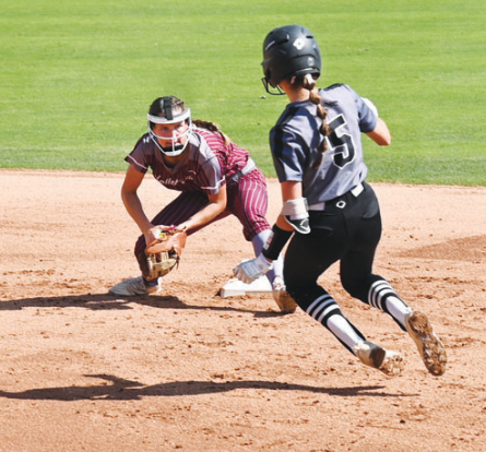 Lady Brahma shortstop Macey Pustka has the ball waiting on an attempted steal in the first inning, Chuck Grafe/Tribune-Herald