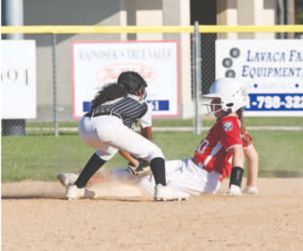 Kasie Davis steals second in the second inning of Sunday’s game. Chuck Grafe/Tribune/Herald