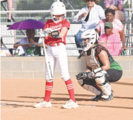Heidi Grahmann checks her wristband before stepping into the batter’s box. .Chuck Grafe/Tribune-Herald