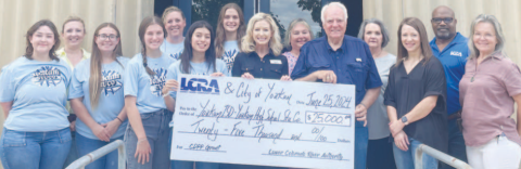 Pictured from left to right are YHS Student Council Secretary Jordyn Eviez, Yoakum Chamber of Commerce Board Chair Alexa Fikac, Illana Garcia, YHS Student Council Vice President, YHS Student Council Communications and Social Media Officer Leah Muenich, YHS Student Council Advisor Amy Robbins, YHS Student Council President Abbie Galvan, YHS Student Council Treasurer Samantha Adamek, LCRA Board Member Margaret D. “Meg” Voelter, City of Yoakum Mayor Pro Tem Tanya Wenzel, City of Yoakum Mayor Carl O’Neill..