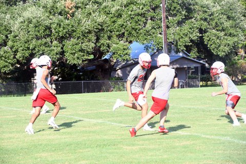 The Cardinals run a drill during the first week of football practice. SP will scrimmage Schulenburg and Bartlett today.Photo by Mark Lube.