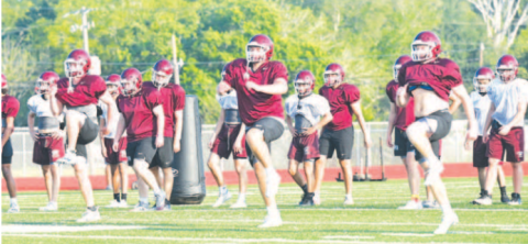 The Brahmas loosen up before Thursday’s practice Chuck Grafe/Tribune-Herald