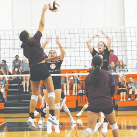 Kasey Harper attacks during the scrimmage in Schulenburg Friday Chuck Grafe/Tribune-Herald