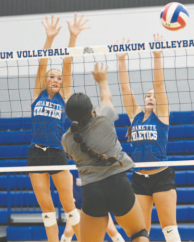 From left, Rylan Dworsky and Ella Demel defend in Friday’s scrimmage in Yoakum. Chuck Grafe/Tribune-Herald