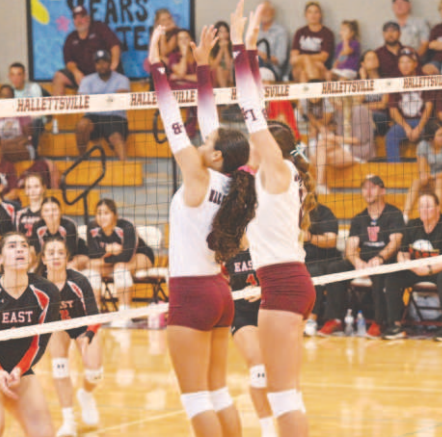 Kasey Harper, left and Christine Felcman defend during Hallettsville’s loss to Victoria East here Tuesday, Aug. 20. Chuck Grafe/Tribune-Herald