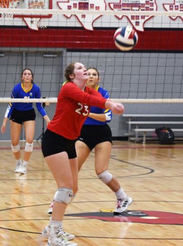 Addy Matias plays a ball in the Lady Cardinals’ four-set win over SMHC Sept. 17. Photo by Mark Lube.