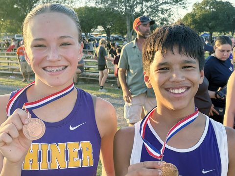 Shiner JH medal winners at Schulenburg CC meet last Thursday. From left are Alena Winkenwerder and Josh Lecon. Photo courtesy of Michelle Winkenwerder.