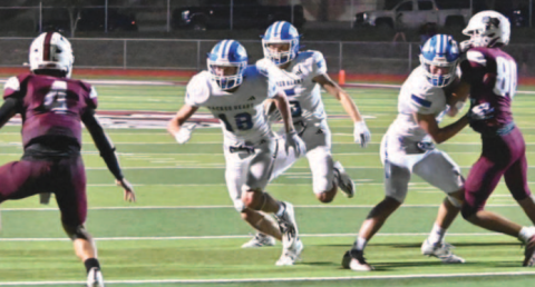 Halfback Riley Haas (5) en route to the game-winning touchdown. PHOTO CREDIT MELISSA KUTAC