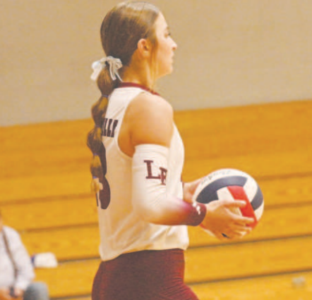 Addison Matula prepares to serve in the Edna loss here Tuesday, Sept. 17. Chuck Grafe/Tribune-Herald