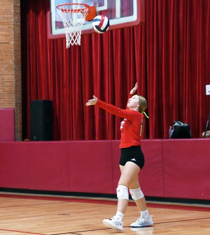 Sloane Kocian serves against Bulverde Bracken on Sept. 26. Photo by Mark Lube.